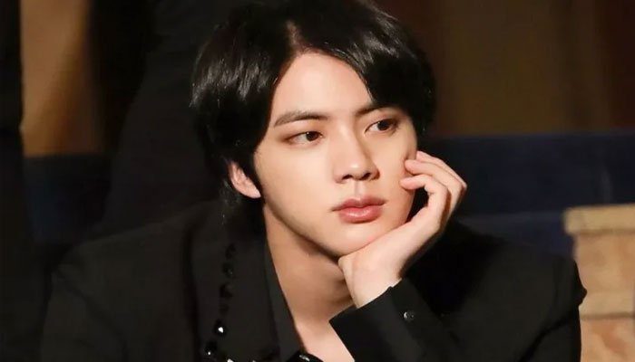 BTS Jin heads to LA for a speculative music video shoot