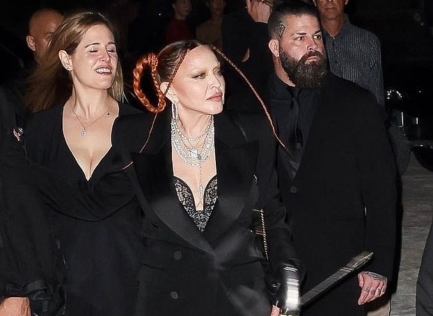 Madonna, 64, turned heads in lingerie and wields riding crop at Sex book exhibition