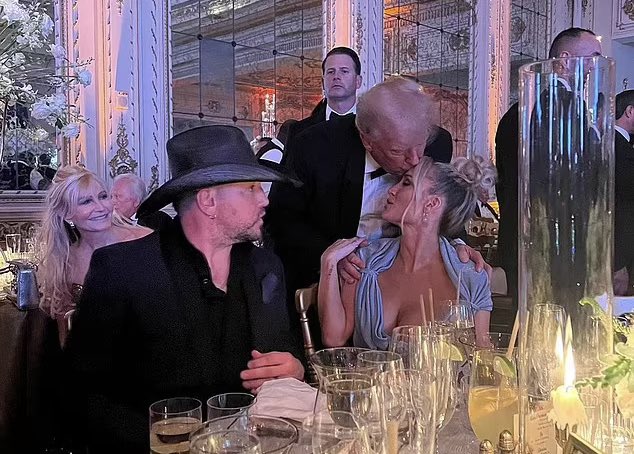 Donald Trump Kisses Jason Aldean's Wife On NYE, Gets Mocked