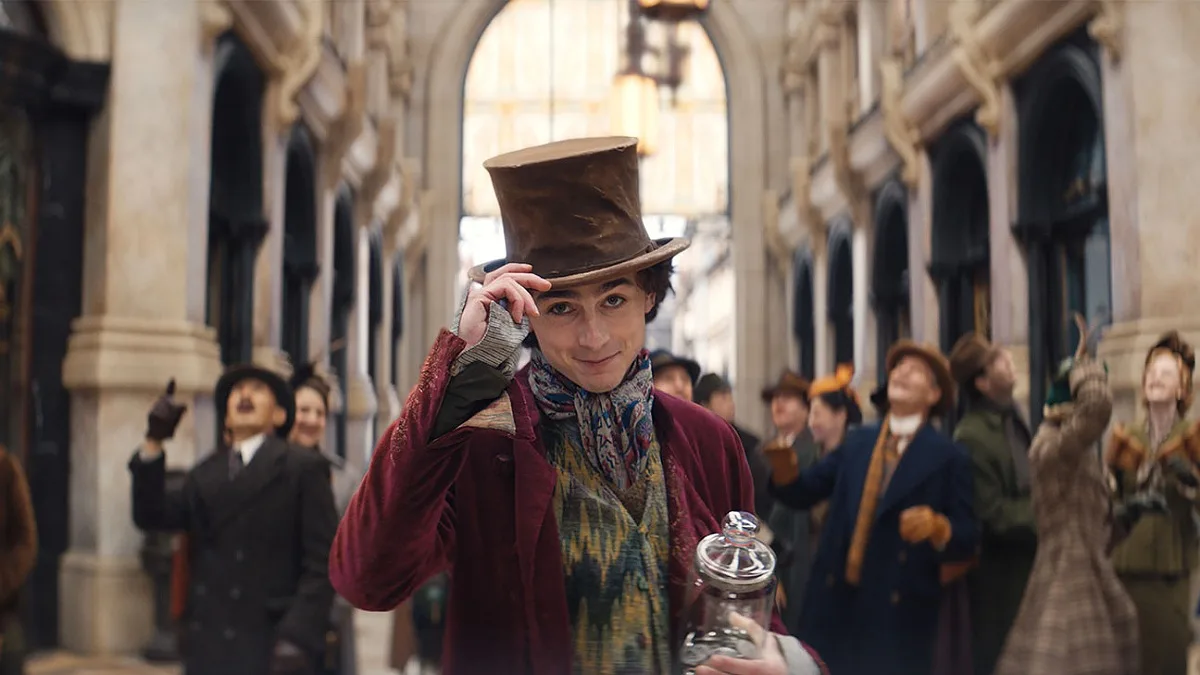 Video: Timothée Chalamet & Tiny Hugh Grant Meet in 'Wonka Trailer'!