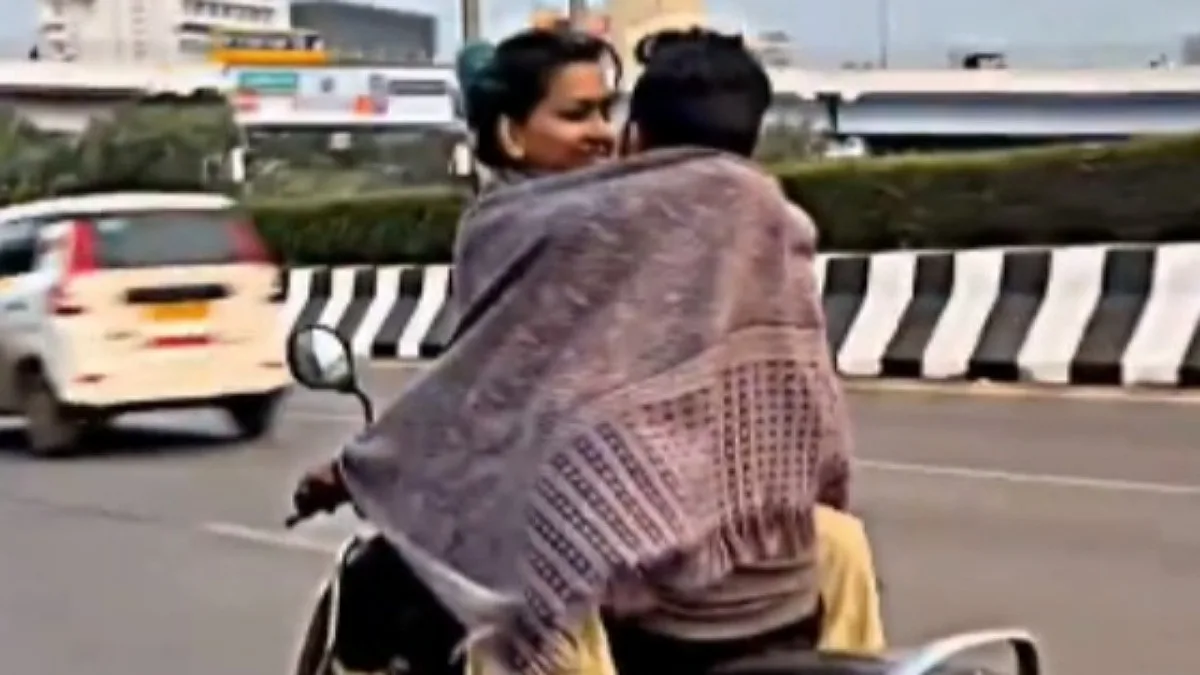Sizzling Scooter Serenade Sparks Social Media Storm: Mumbai Couple's PDA Goes Viral