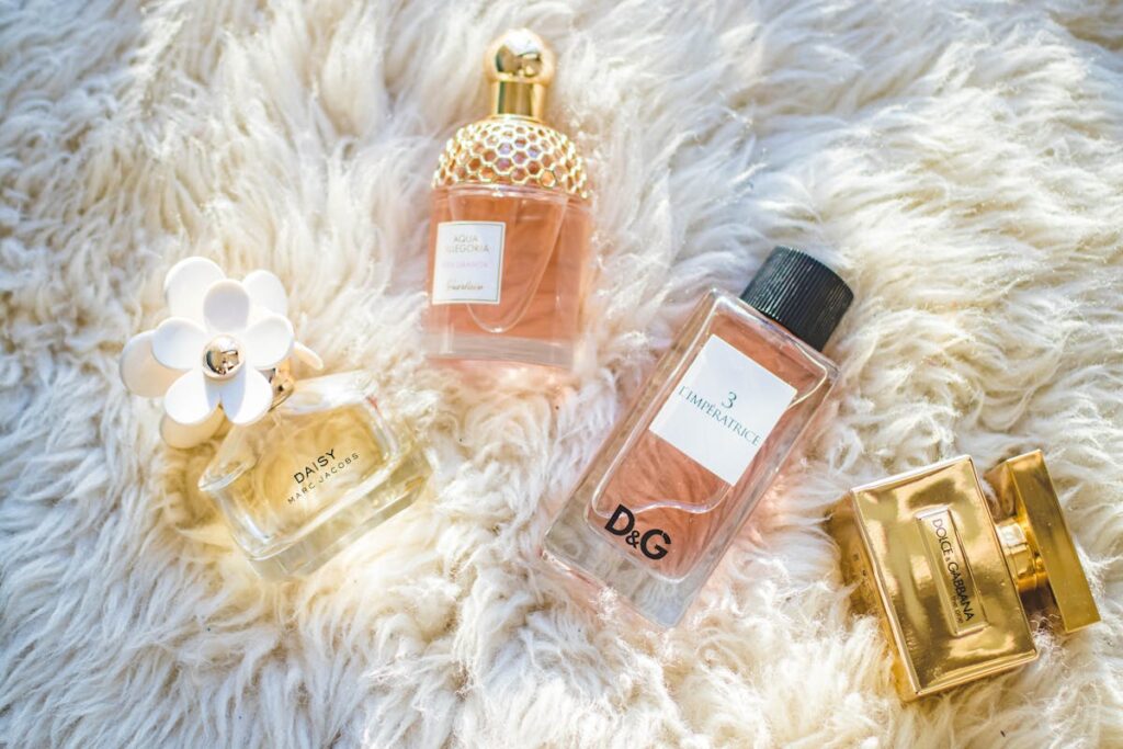 Four Assorted Perfume Glass Bottles