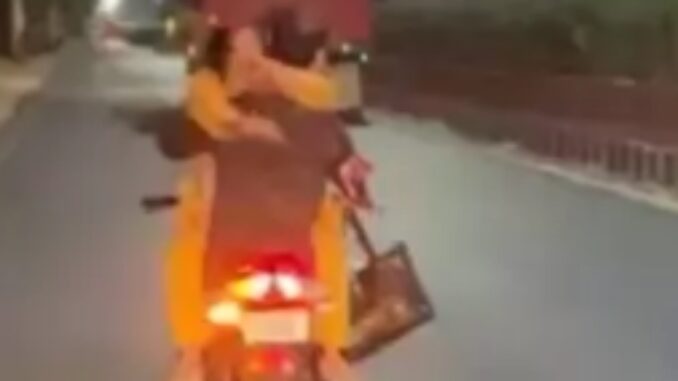 Bike Romance Gone Wild: Kota Couple's Reckless Stunt Sparks Police Concern