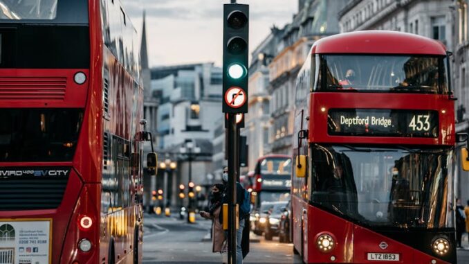 London Red Buses on Street