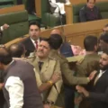 “Chaos in J&K Assembly: BJP Members Marshalled Out Over Special Status Resolution”