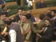 “Chaos in J&K Assembly: BJP Members Marshalled Out Over Special Status Resolution”