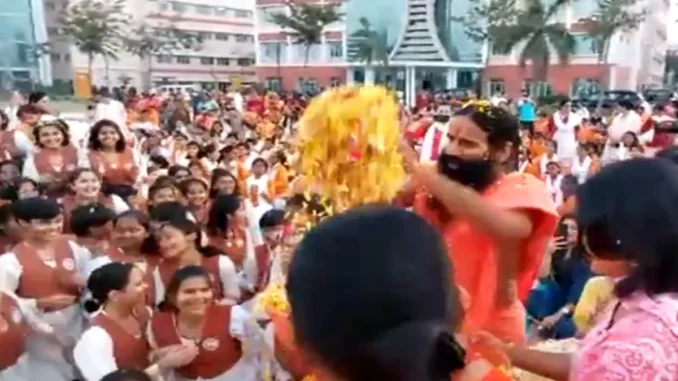 Yog Guru Ramdev celebrated phoolon ki Holi with students at the University of Patanjali,