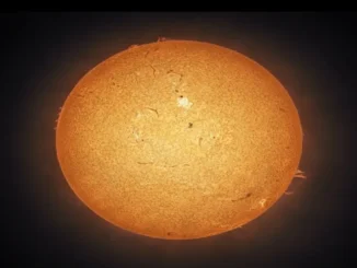 A Perfectly Timed Solar Flare and ISS Transit