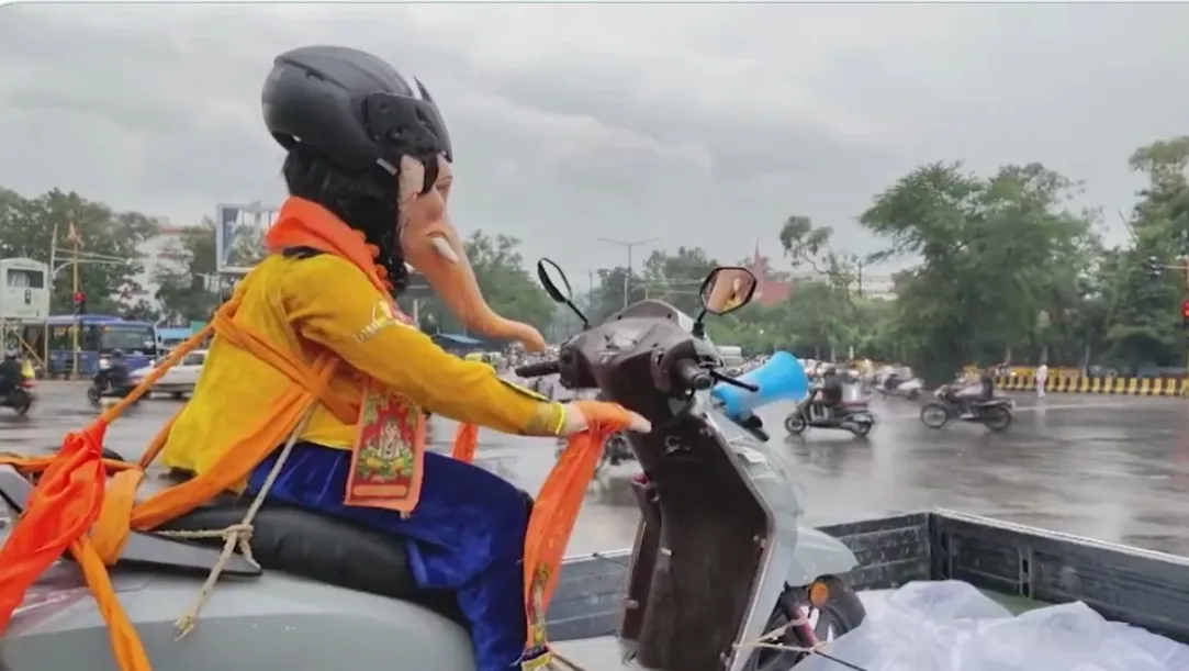 Ganesh Idol on Scooter Wears Helmet to Promote Road Safety