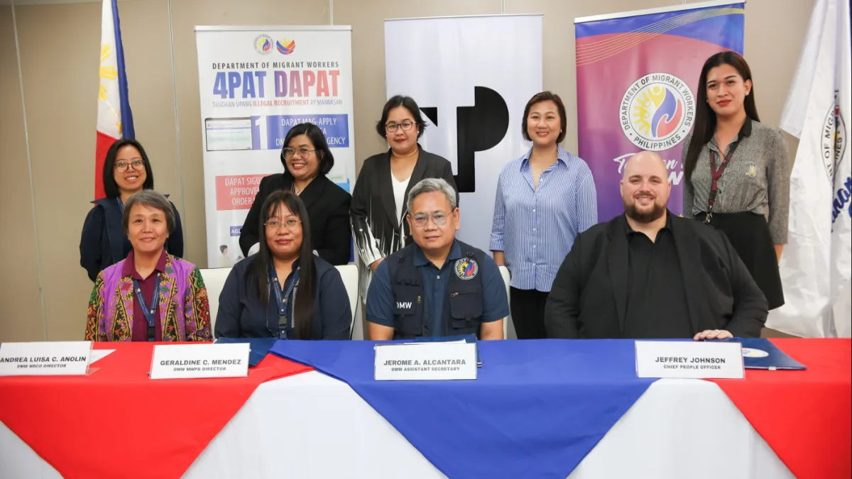TP and DMW officials sign MOA for OFW reintegration