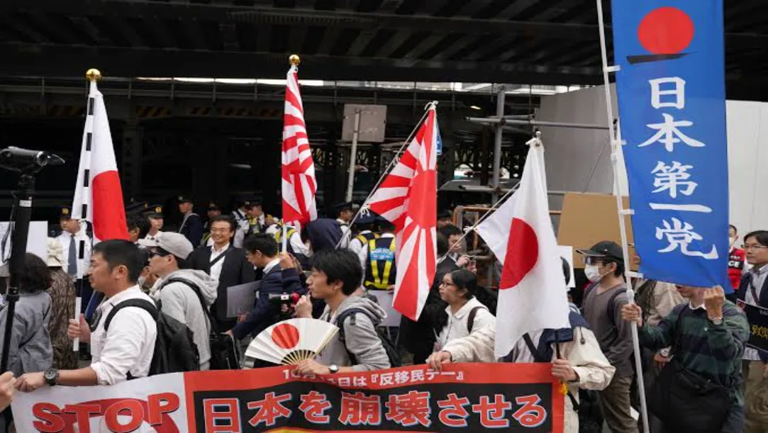 Osaka immigration protest march August 2025