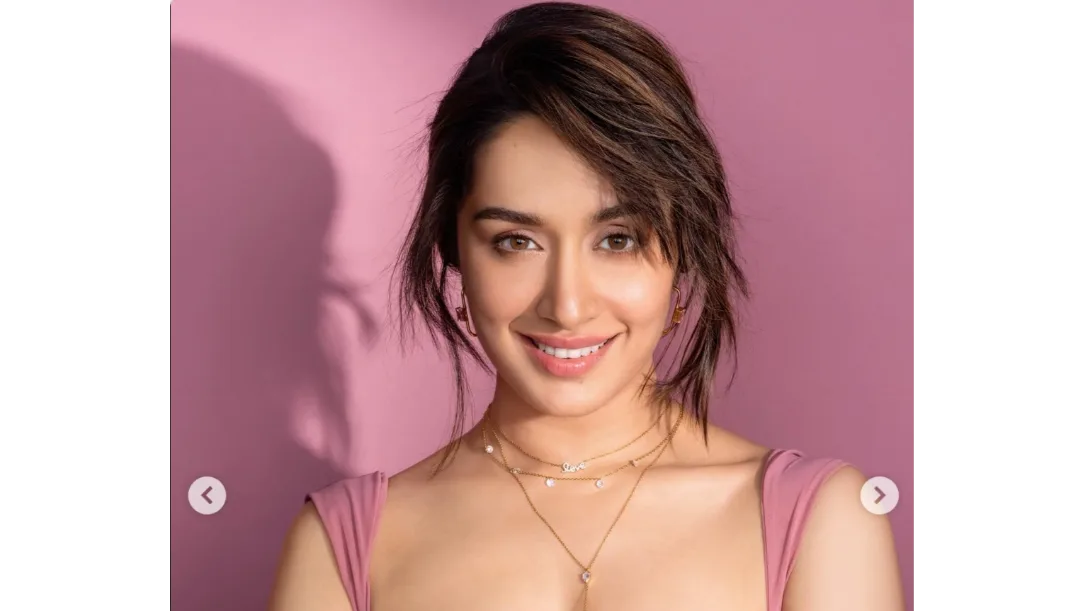 Shraddha Kapoor smiling in a pink outfit,