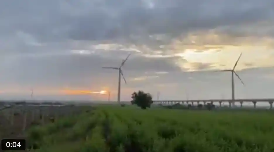 Close-up of the engineering arches of the Tidagundi Aqueduct with flowing water.