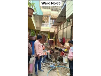 Corporator Sunita Prakash Burabure inspecting pipeline construction in Ward 65.