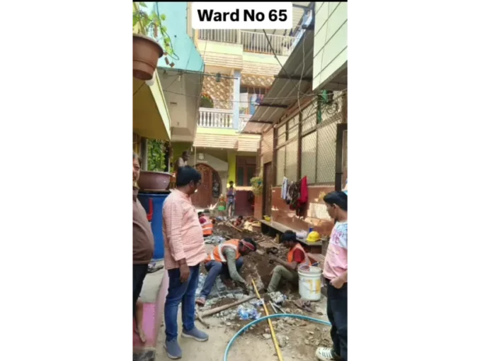 Corporator Sunita Prakash Burabure inspecting pipeline construction in Ward 65.