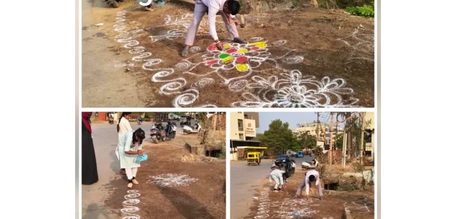 HDMC officials standing near a Rangoli-decorated clean spot in Hubballi.