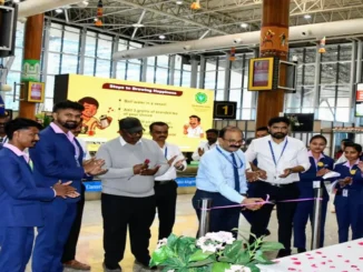 Airport Director Rupesh Kumar Sripad inaugurating the new May I Help You desk at Hubballi Airport.