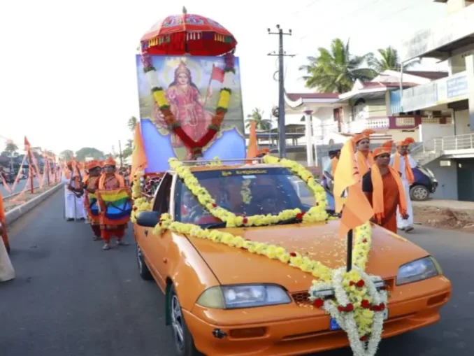 A massive crowd participating in the Hindu Sangama Shobhayatra in Konandur, Thirthahalli, led by MP B.Y. Raghavendra.