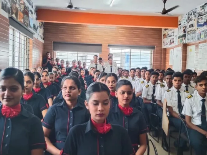 Students attending awareness program on POCSO, NDPS, traffic rules, and cyber security at Vision Fly Training Institute Hubli