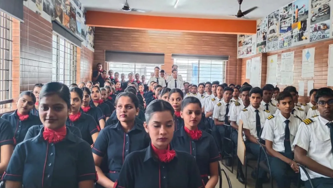 Students attending awareness program on POCSO, NDPS, traffic rules, and cyber security at Vision Fly Training Institute Hubli