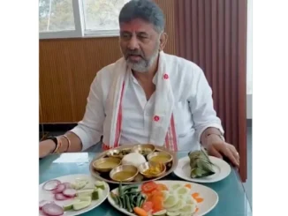 DK Shivakumar enjoying Assamese cuisine during campaign