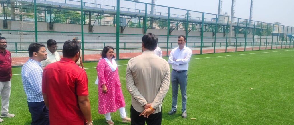 DC Snehal R. and Commissioner Rudresh Ghali inspecting the Hubballi Sports Complex construction.