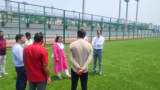 DC Snehal R. and Commissioner Rudresh Ghali inspecting the Hubballi Sports Complex construction.