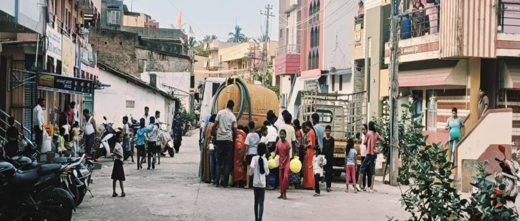 Water tanker and flooded road near Tarihal Bypass in Hubballi