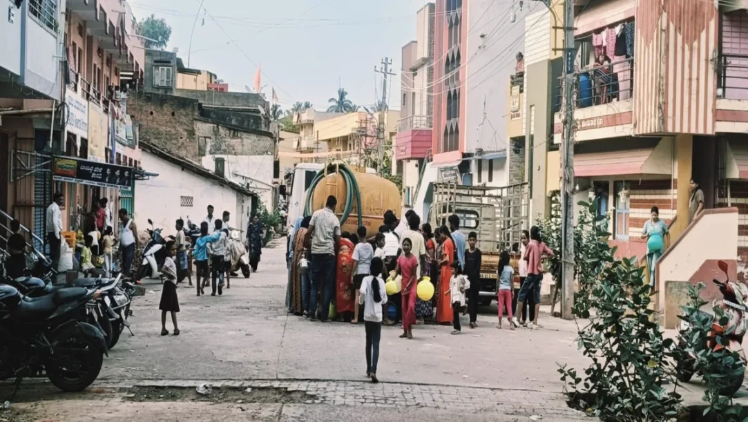 Water tanker and flooded road near Tarihal Bypass in Hubballi