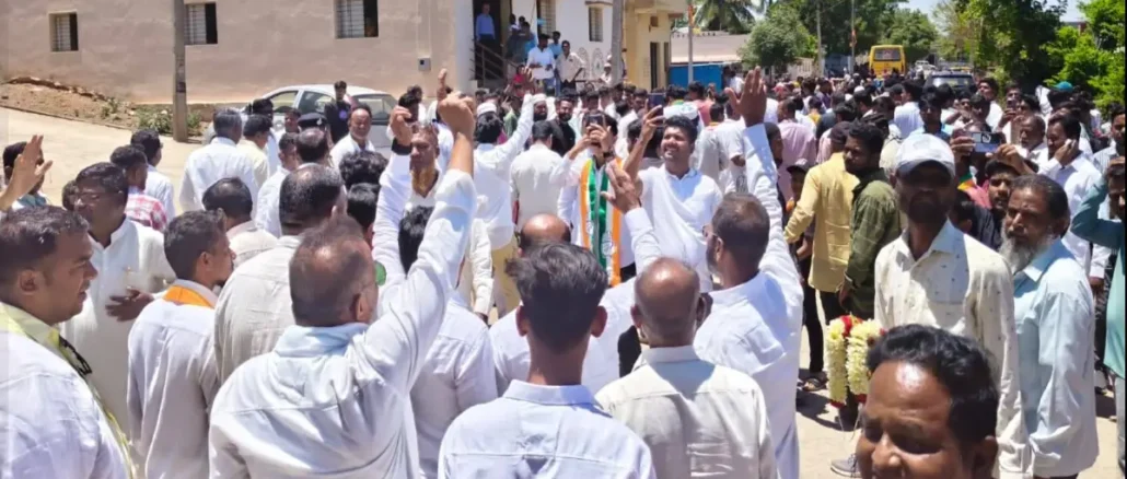 MLA Asif Sait leading a roadshow in Bagalkot with large crowds of supporters