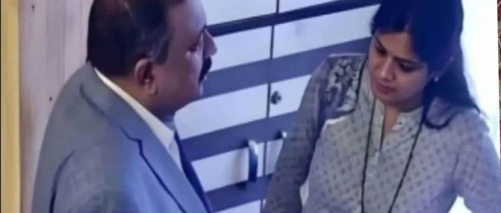 Rupali Chakankar and Ashok Kharat in a viral video clip during a public event.