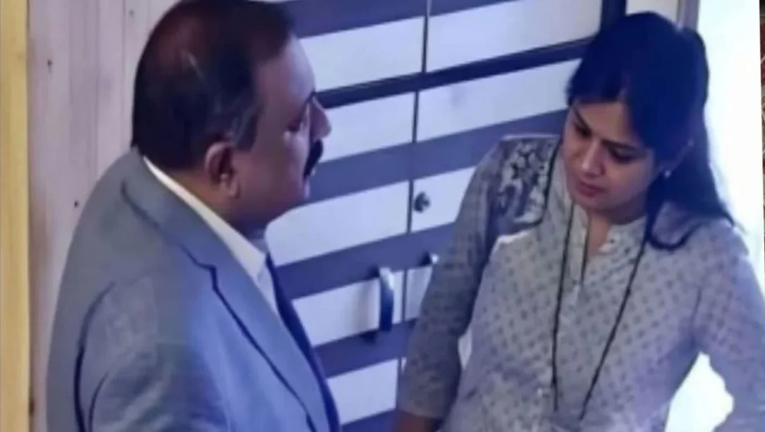 Rupali Chakankar and Ashok Kharat in a viral video clip during a public event.