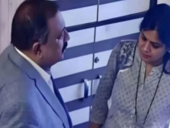 Rupali Chakankar and Ashok Kharat in a viral video clip during a public event.