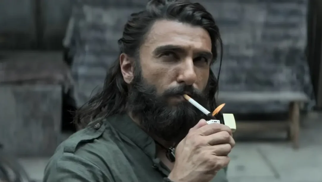 Dhurandhar 2 movie poster celebrating ₹900 crore India net and ₹1,490 crore worldwide gross.