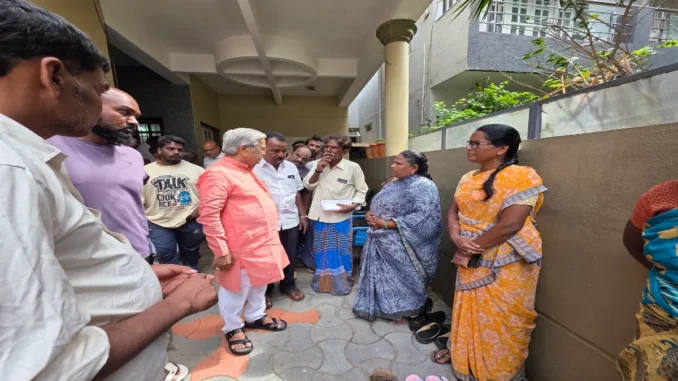 Govind Karjol interacting with farmers and local residents during a public grievance meeting in Chitradurga