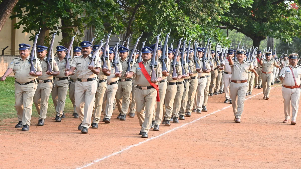 Police Commissioner N Shashi Kumar IPS receiving salute during weekly parade at Hubballi Old CAR grounds with DCP Shruti NS and DCP Ravish CR.