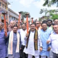 Pralhad Joshi leading the Hubballi Seva Jyoti Yatra for 25 years of Narendra Modi’s public service