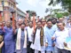 Pralhad Joshi leading the Hubballi Seva Jyoti Yatra for 25 years of Narendra Modi’s public service