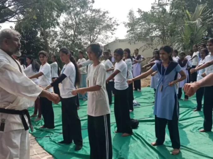 Students at karate self-defense training camp in Nagarahalli government school