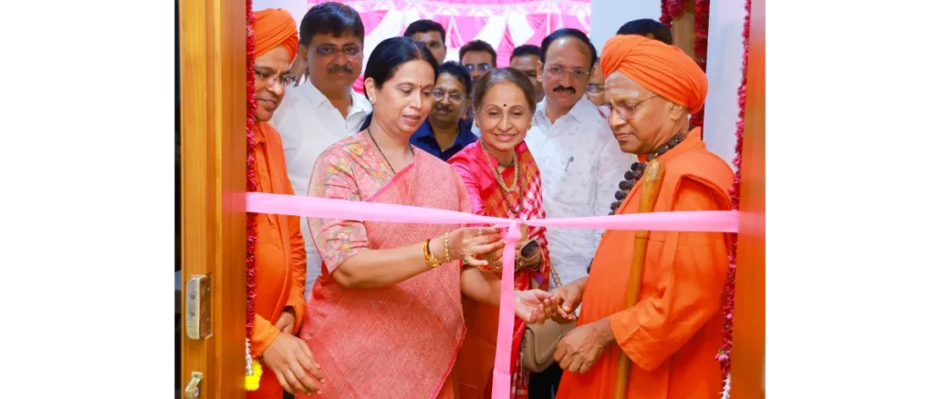 Laxmi Hebbalkar and Dr. Tontada Siddharama Mahaswami at the Gurubhavan inauguration in Jayanagar