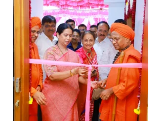 Laxmi Hebbalkar and Dr. Tontada Siddharama Mahaswami at the Gurubhavan inauguration in Jayanagar
